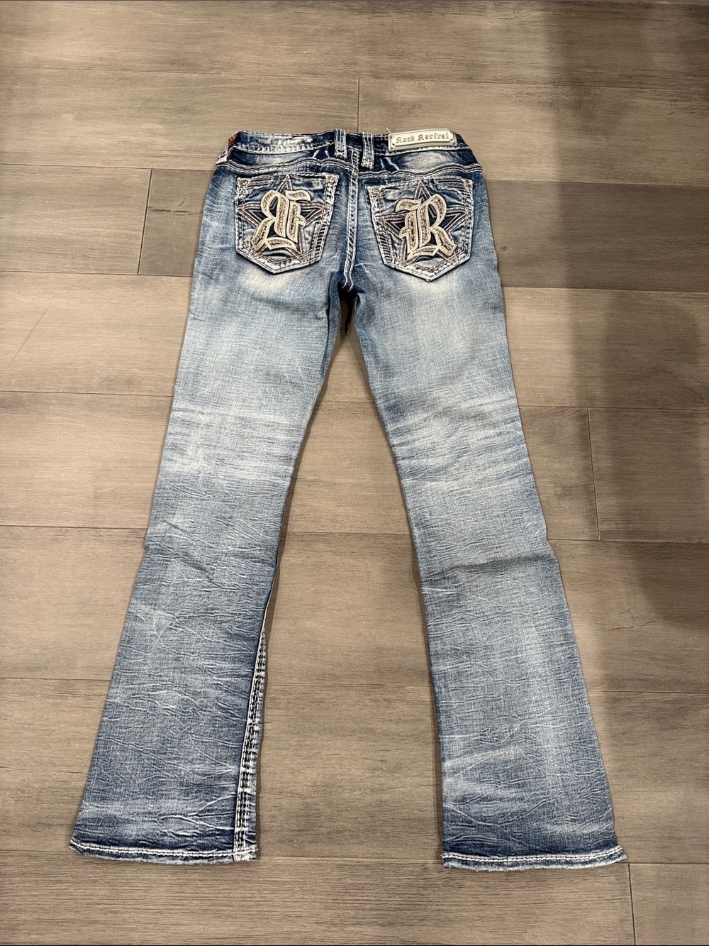 Rock Revival Light Blue Mid Rise Boot Cut Jeans with Embroidered Back Pockets